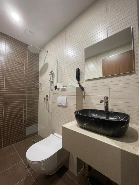Koupelna v ubytování Cozy Loft Hotel