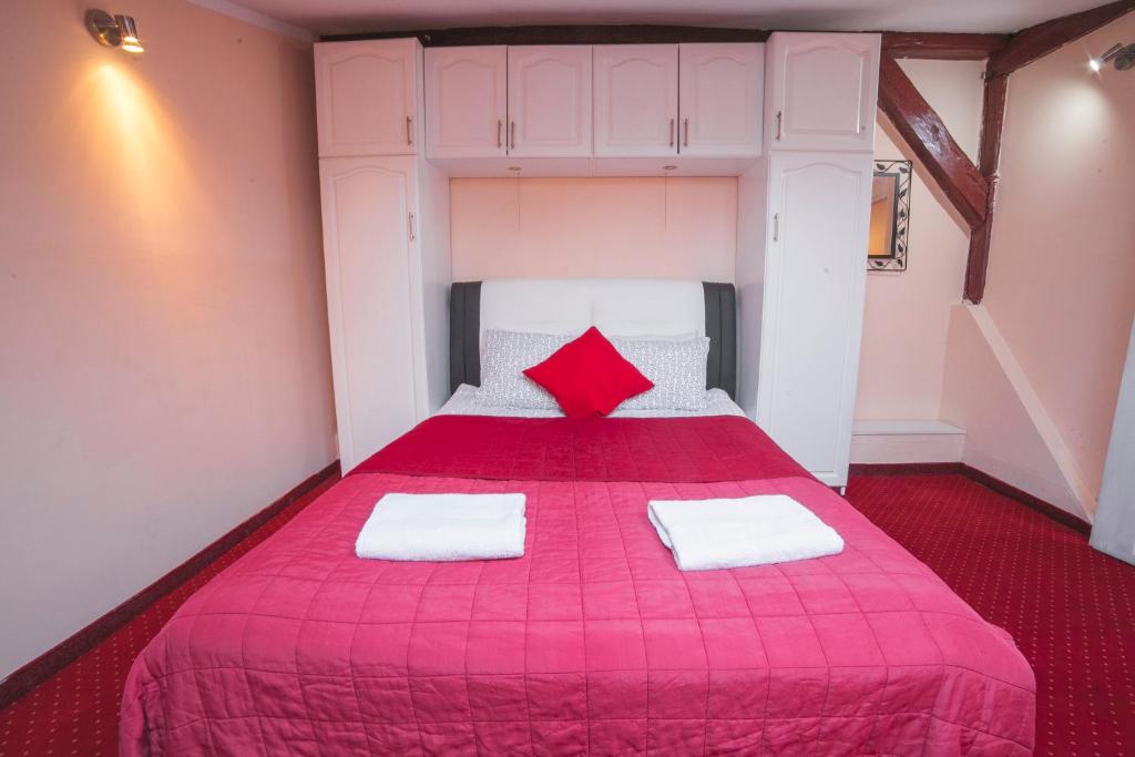 Posteľ alebo postele v izbe v ubytovaní Residence B&B La Fontaine Aparthotel