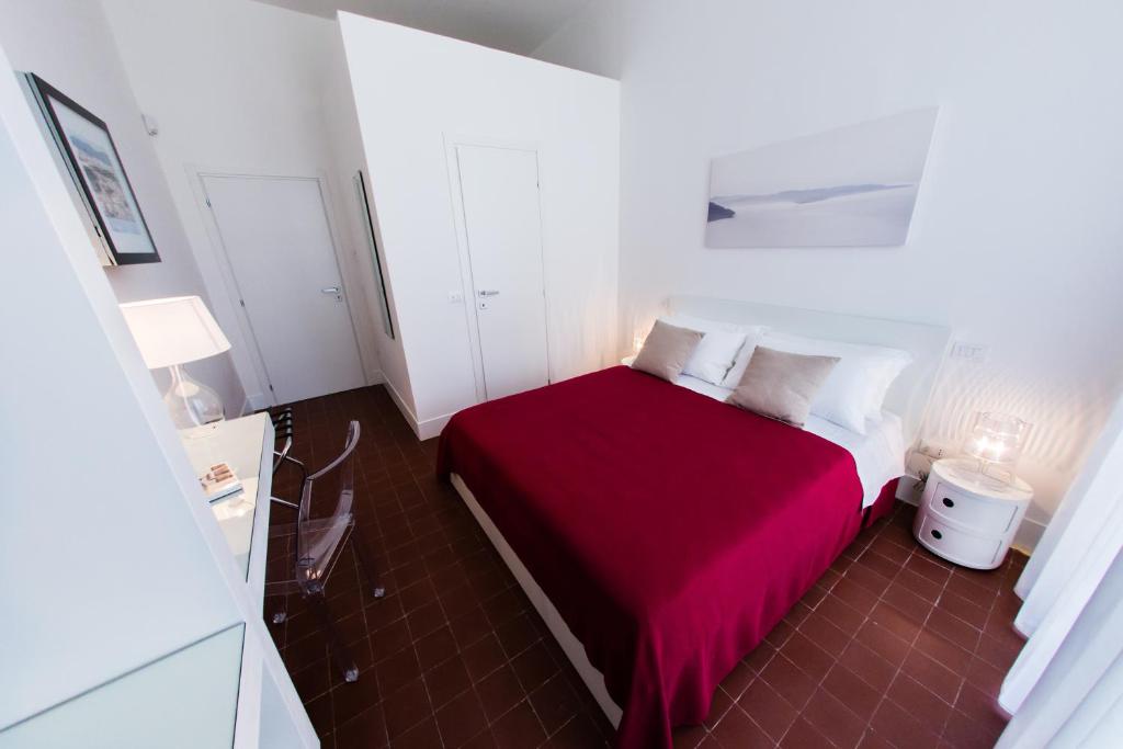 Postel nebo postele na pokoji v ubytování Rhegion B&B