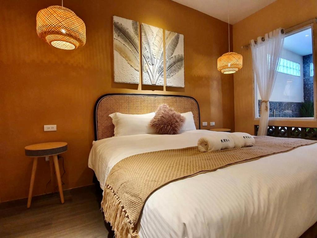 Postel nebo postele na pokoji v ubytování MiM House