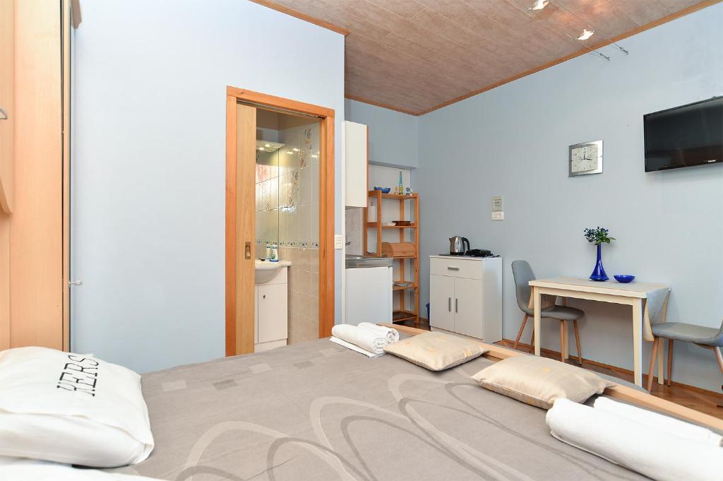 Łóżko lub łóżka w pokoju w obiekcie Apartments Jasna 1128