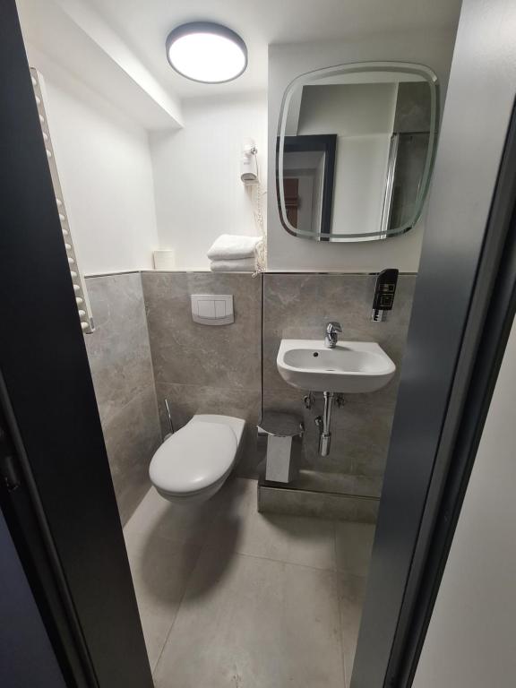 Koupelna v ubytování Altan Hotel