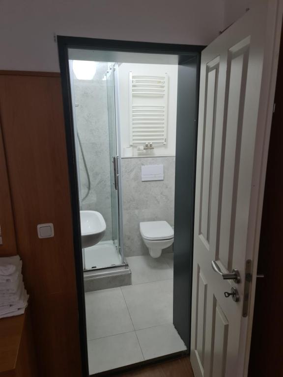 Koupelna v ubytování Altan Hotel