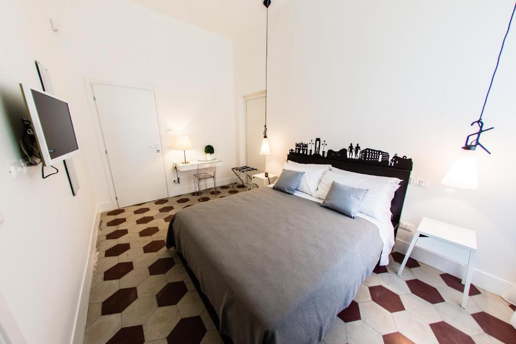 Postel nebo postele na pokoji v ubytování Rhegion B&B