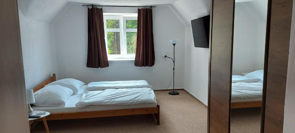 Postel nebo postele na pokoji v ubytování Ubytování v soukromí - Apartmán MERAN