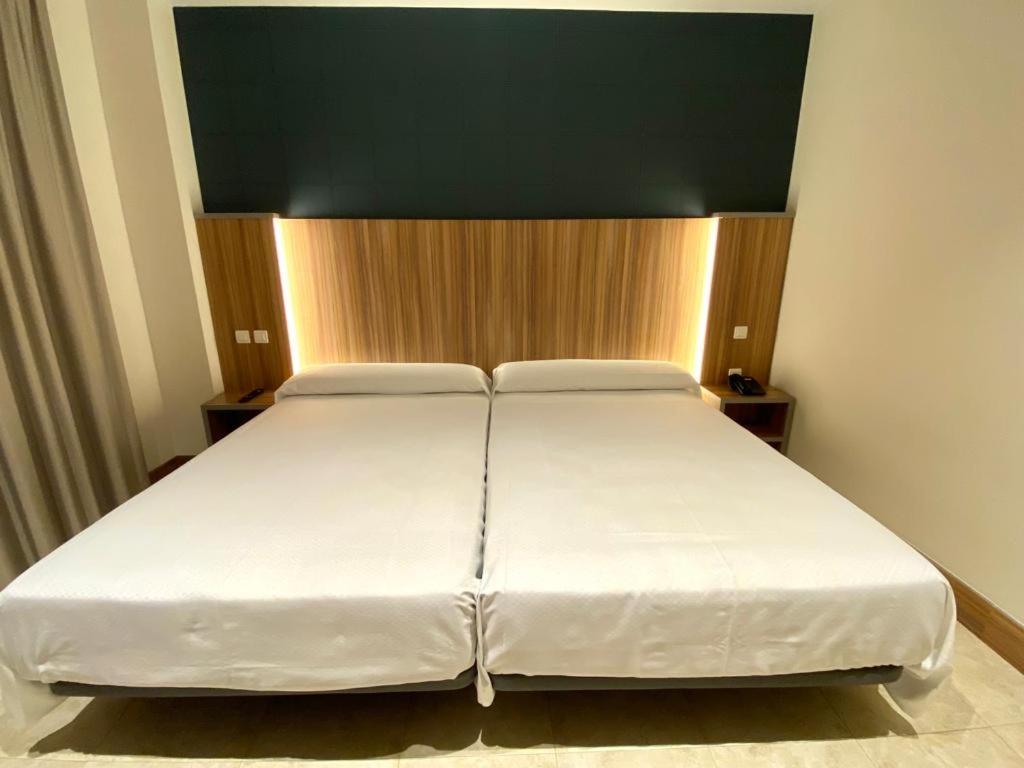 Postel nebo postele na pokoji v ubytování Hotel Camino Real