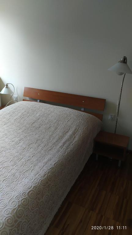 Posteľ alebo postele v izbe v ubytovaní Zawoja1560 Apartamenty przy Aptece