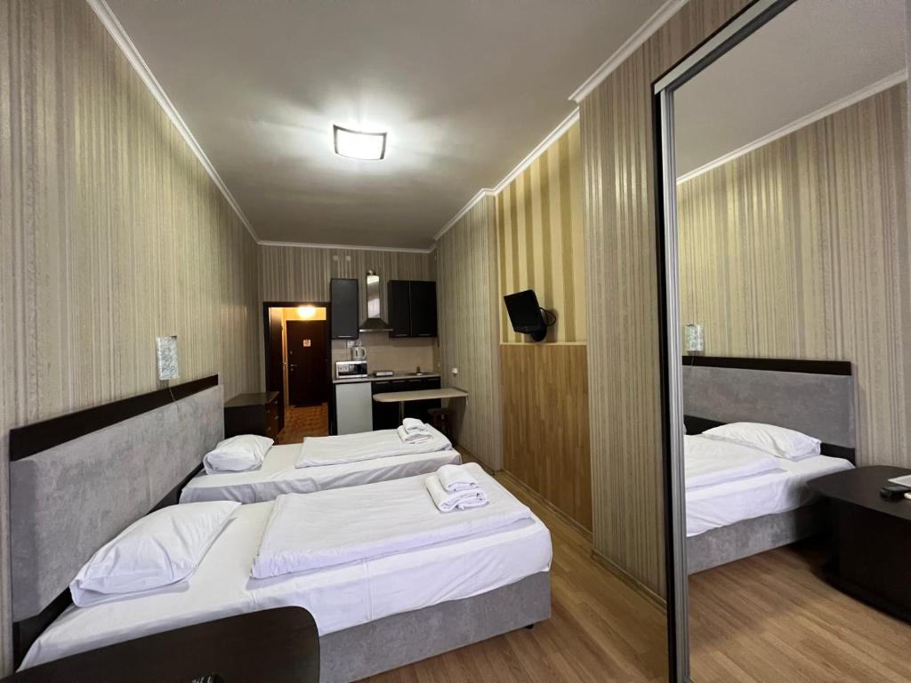 Postel nebo postele na pokoji v ubytování The apartments