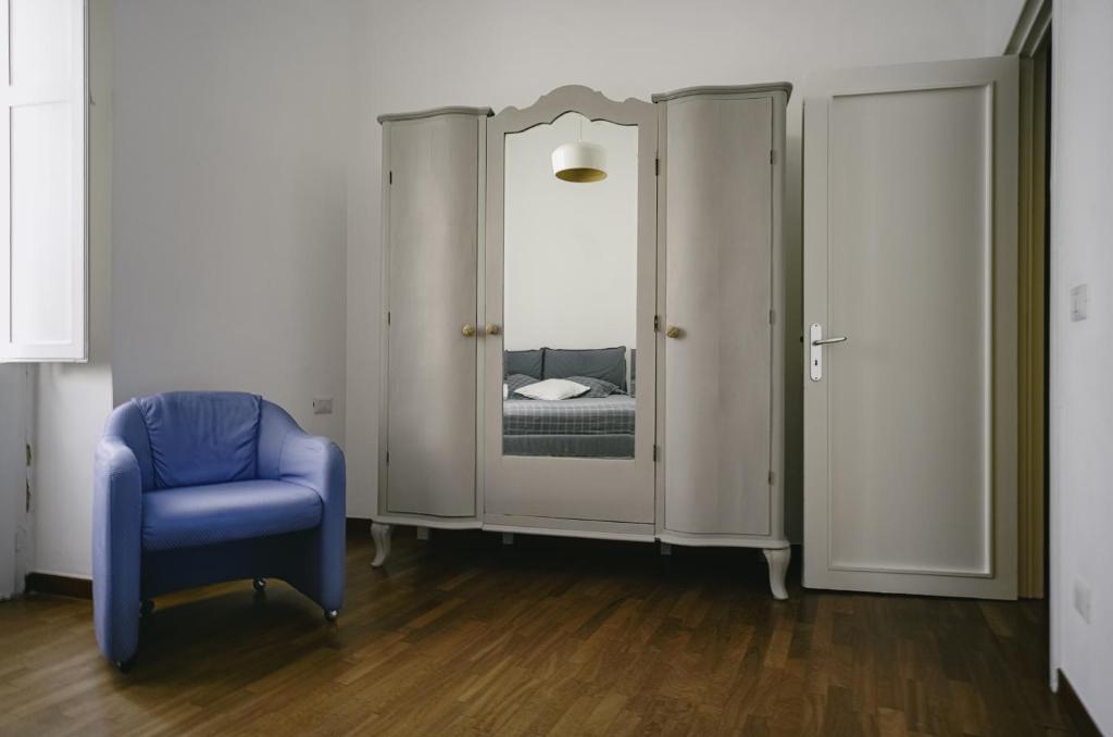 Łóżko lub łóżka w pokoju w obiekcie CASA FISCARDI