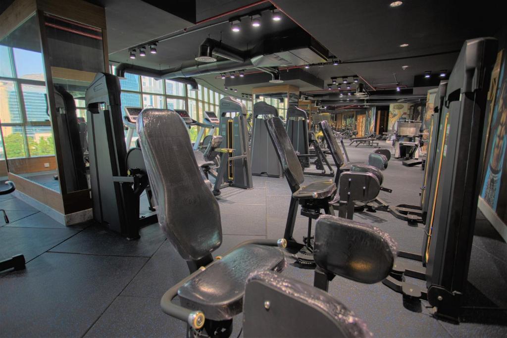 Fitness centrum a/nebo fitness zařízení v ubytování Midan Hotel & Suites Al Aziziya