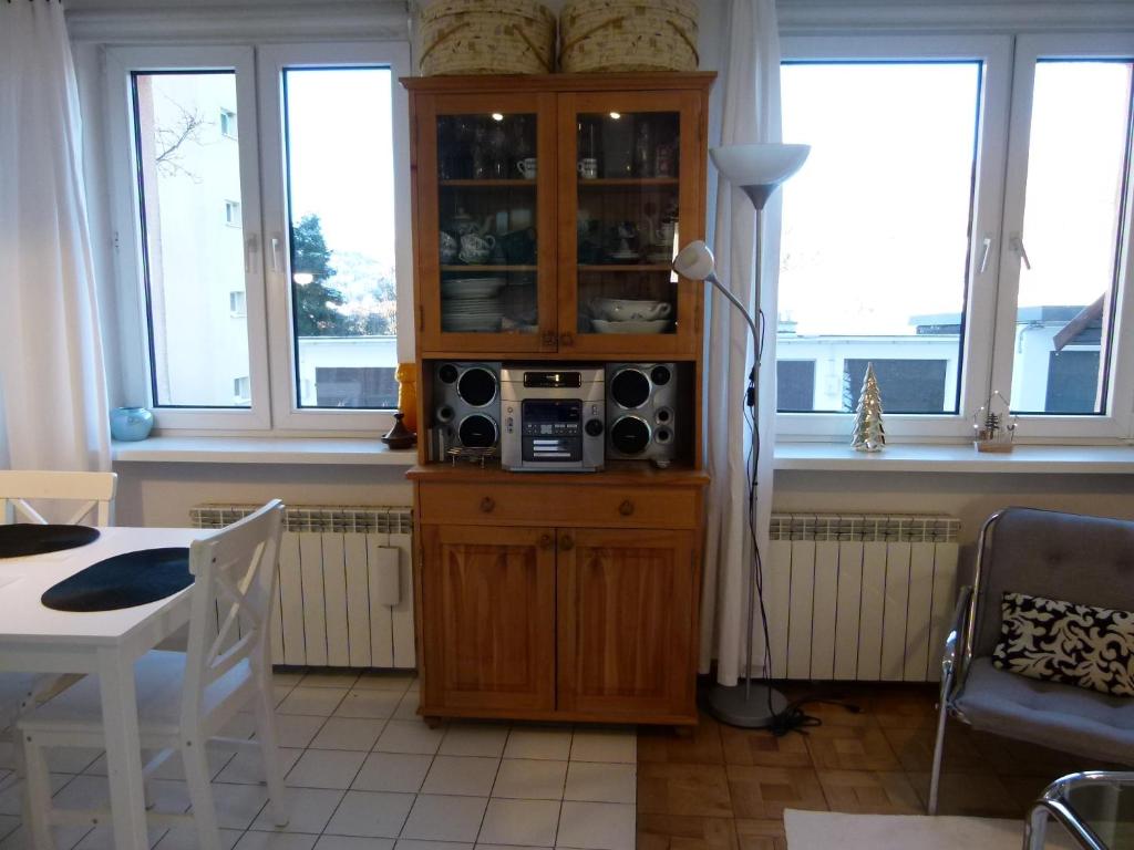 Kuchyň nebo kuchyňský kout v ubytování Apartament BB Źródlana