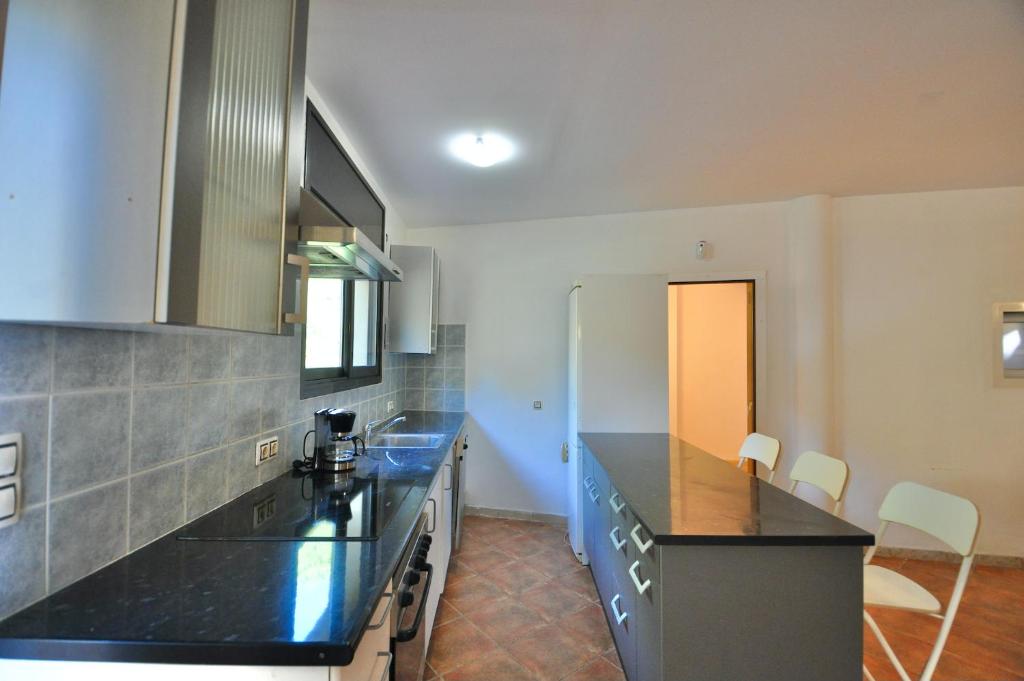 Kuchyň nebo kuchyňský kout v ubytování Villa Soleina