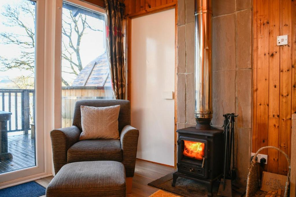 Posezení v ubytování Loch Aweside Forest Cabins