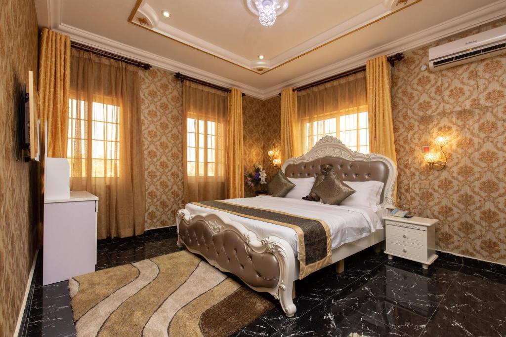 Postel nebo postele na pokoji v ubytování AG HOTEL AND SUITES
