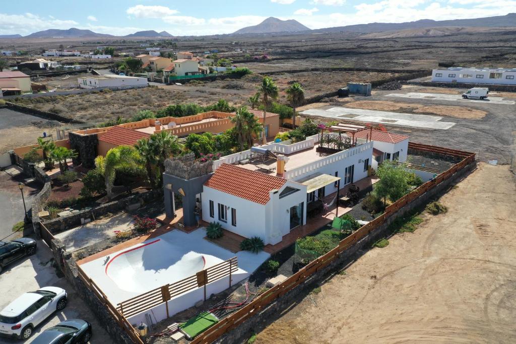 an aerial view of a building in a desert at Da Mata Kite&Surf House in Lajares