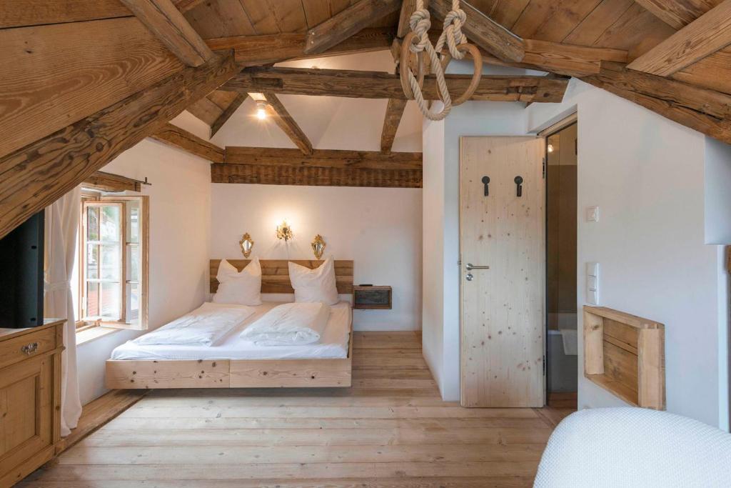 Postel nebo postele na pokoji v ubytování das-hornsteiner