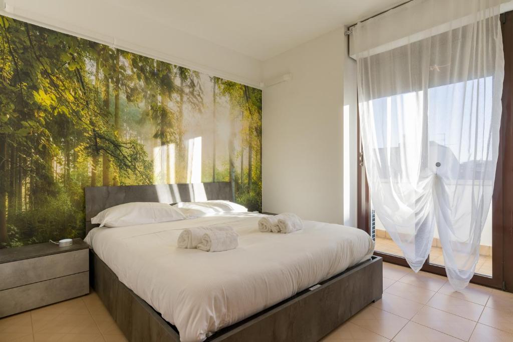 Ένα ή περισσότερα κρεβάτια σε δωμάτιο στο Casa Mya