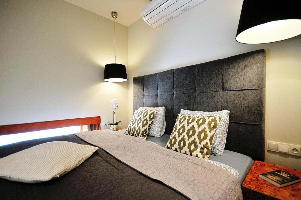Posteľ alebo postele v izbe v ubytovaní 423 w ROYAL TULIP SAND 200 m plaża DOBRUK APARTAMENTY