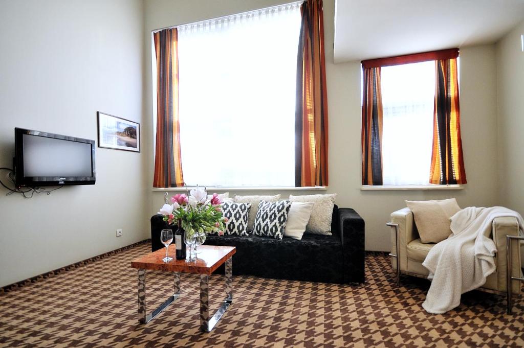Televízia a/alebo spoločenská miestnosť v ubytovaní 423 w ROYAL TULIP SAND 200 m plaża DOBRUK APARTAMENTY