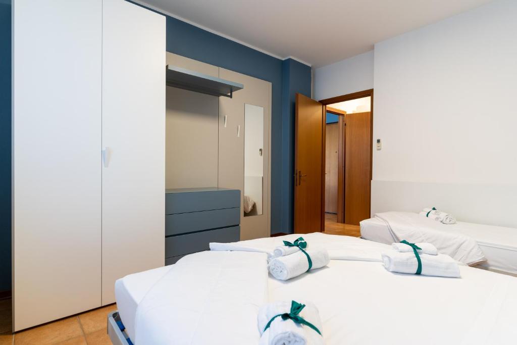 Кровать или кровати в номере Summer Time Family Resort