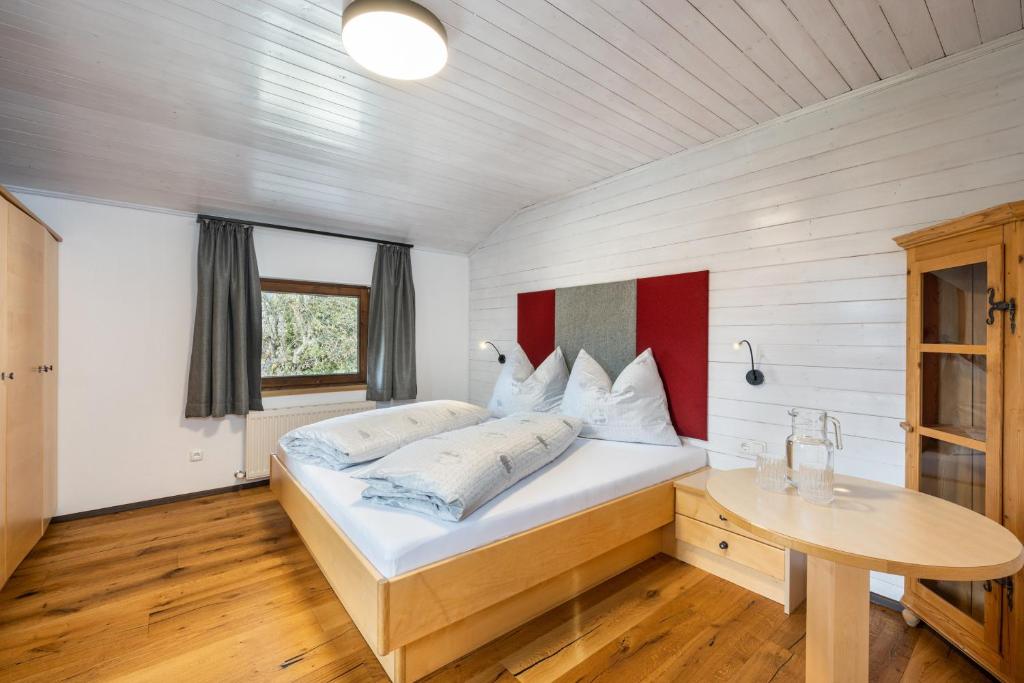 Postel nebo postele na pokoji v ubytování Wohn-Leben Altenmarkt Apartments