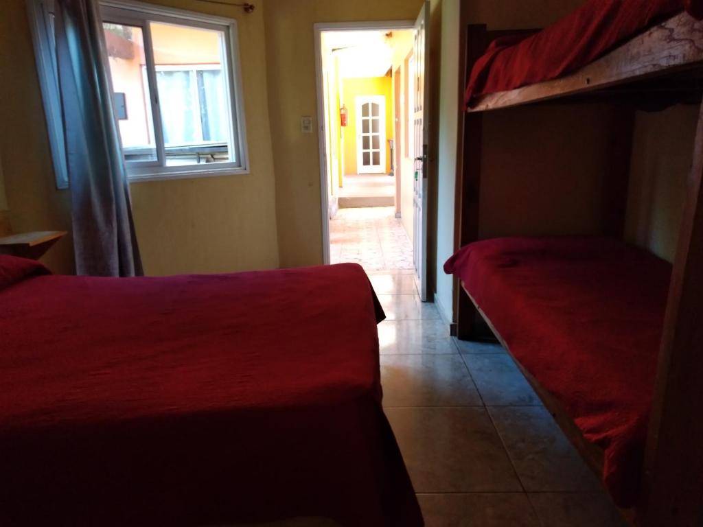 Postel nebo postele na pokoji v ubytování Sweet Guest House