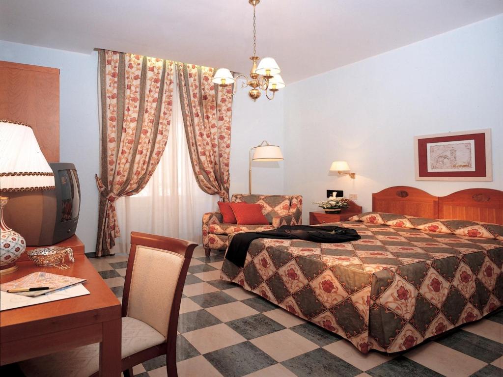 Postel nebo postele na pokoji v ubytování Hotel Aberdeen