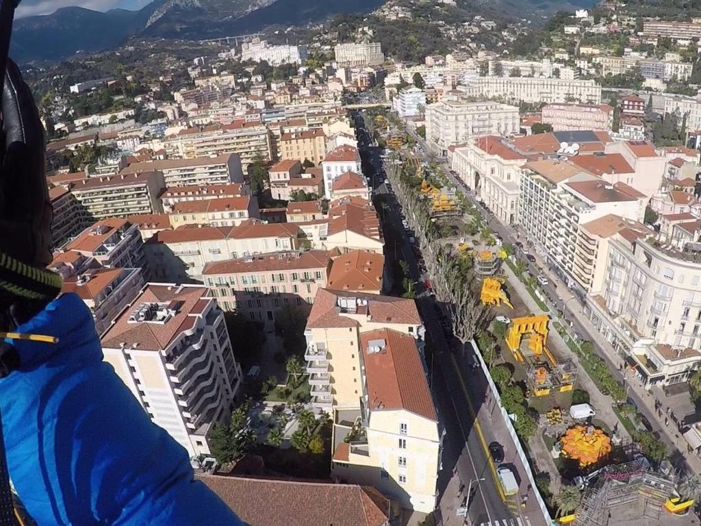 an aerial view of a city with buildings at Hotel Chambord in Menton