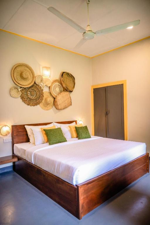 Postel nebo postele na pokoji v ubytování Banana Bunks Kandy
