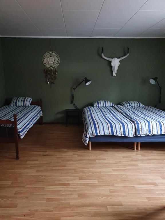 Postel nebo postele na pokoji v ubytování Fyrbo