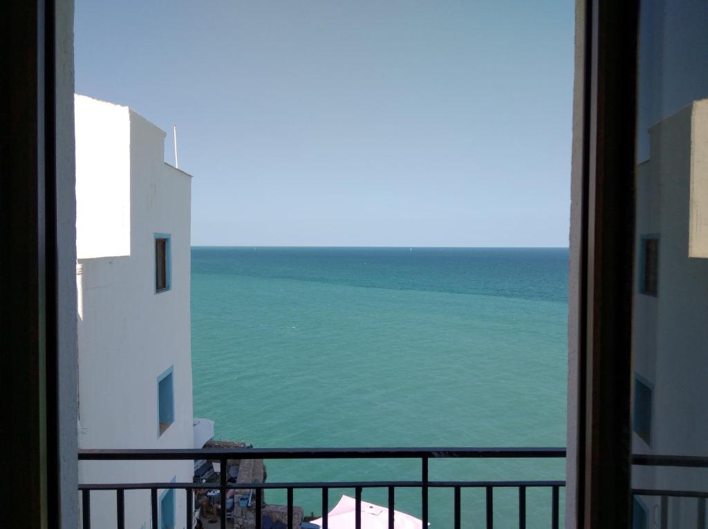 a view of the ocean from a window at BALCO AL MAR in Peñíscola