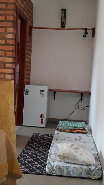 Postel nebo postele na pokoji v ubytování Casa dos Sonhos Hospedaria