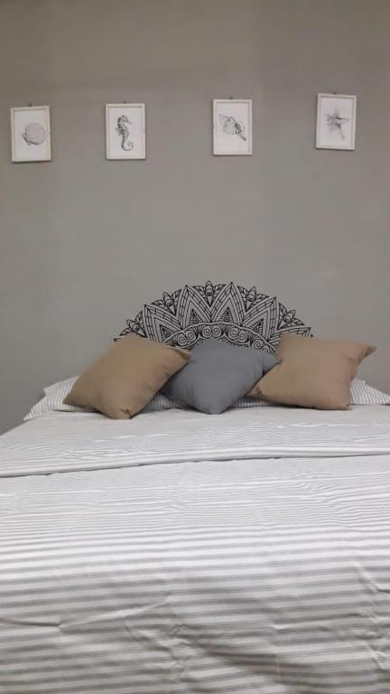 Postel nebo postele na pokoji v ubytování Casa Cálido Hotel