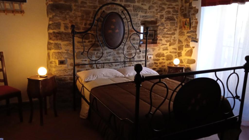 Postel nebo postele na pokoji v ubytování Podere Casorbica