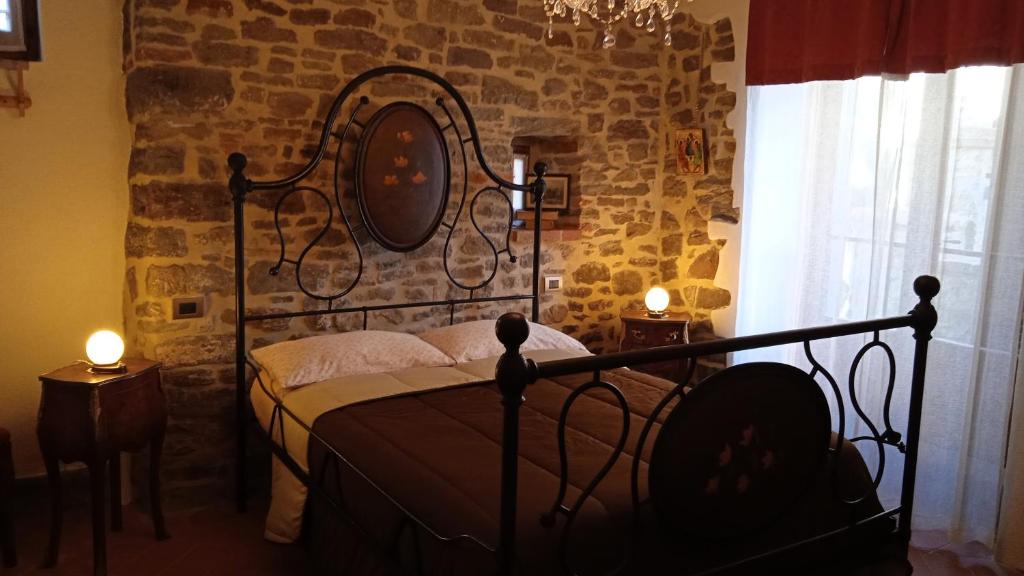Postel nebo postele na pokoji v ubytování Podere Casorbica