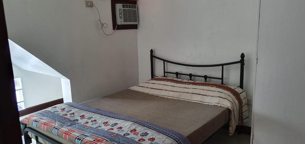 Postel nebo postele na pokoji v ubytování Remarkable 1-Bed Apartment in Davao City