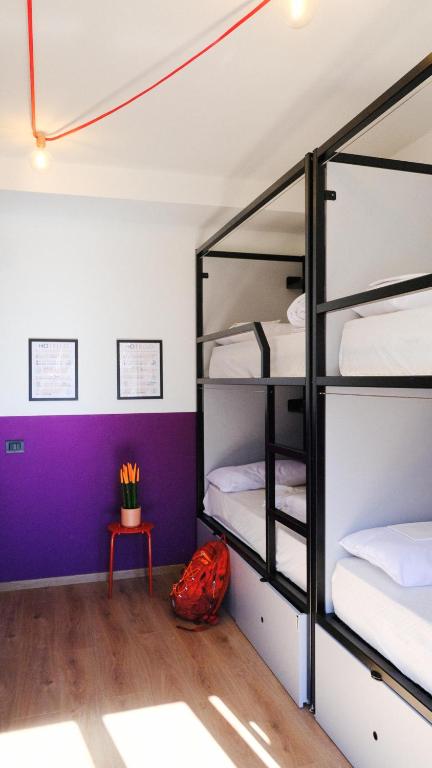 Postel nebo postele na pokoji v ubytování Hotello Hostel