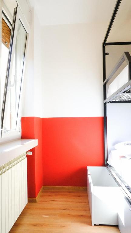 Postel nebo postele na pokoji v ubytování Hotello Hostel