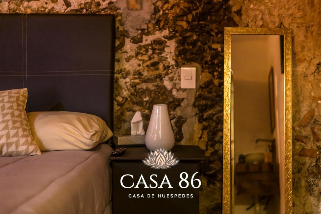 Postel nebo postele na pokoji v ubytování Casa 86