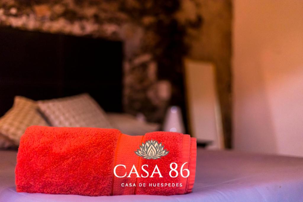 Postel nebo postele na pokoji v ubytování Casa 86