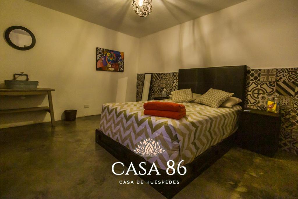 Postel nebo postele na pokoji v ubytování Casa 86