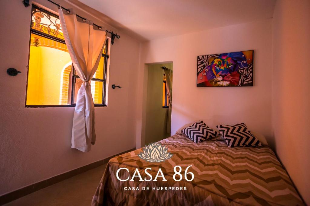 Un ou plusieurs lits dans un hébergement de l'établissement Casa 86