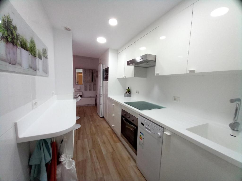 Kuchyň nebo kuchyňský kout v ubytování Apartamentos Medano - Lagos de Miramar Deluxe