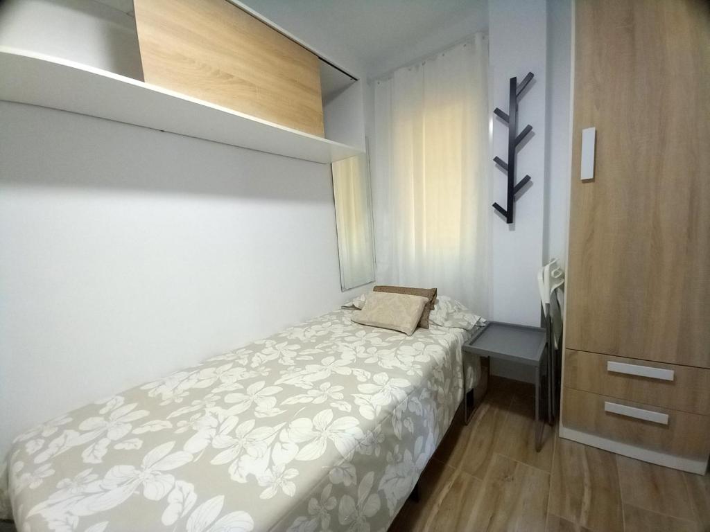 Postel nebo postele na pokoji v ubytování Apartamentos Medano - Lagos de Miramar Deluxe