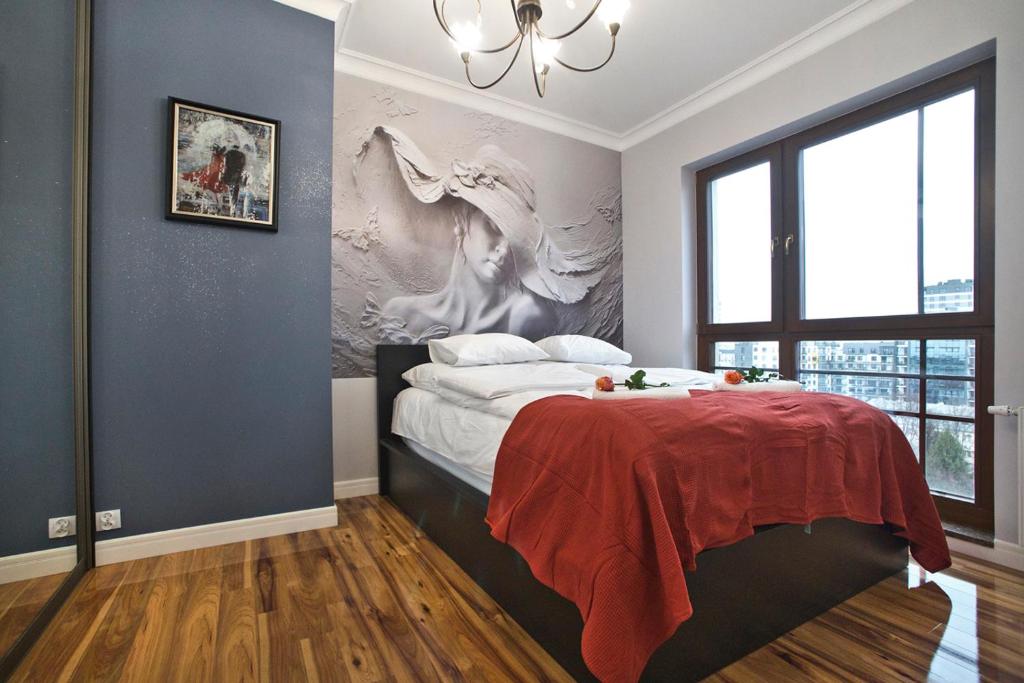 Posteľ alebo postele v izbe v ubytovaní Siedmiogrodzka P&O Serviced Apartments