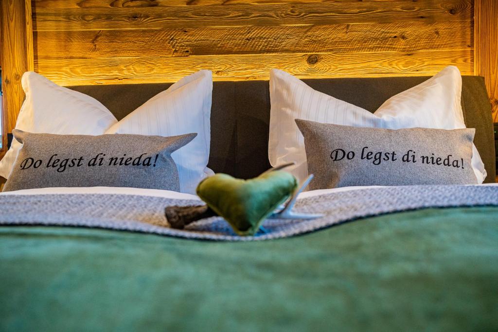 Postel nebo postele na pokoji v ubytování Alm-Chalets-Samerberg