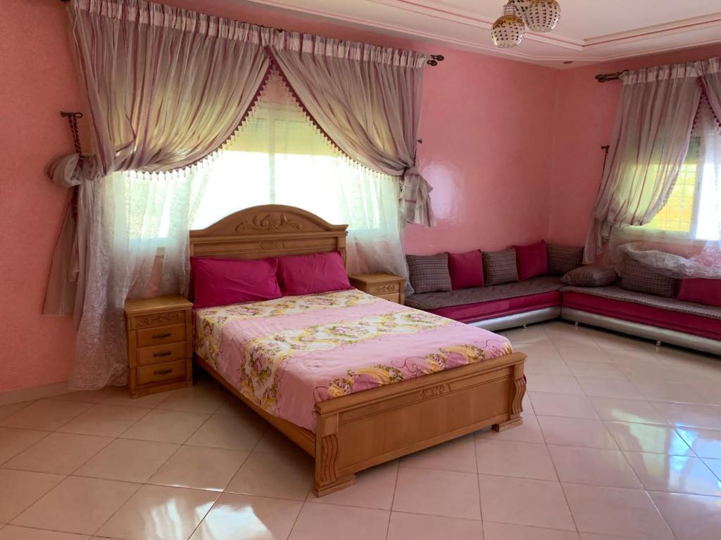 A bed or beds in a room at Villa Bilal