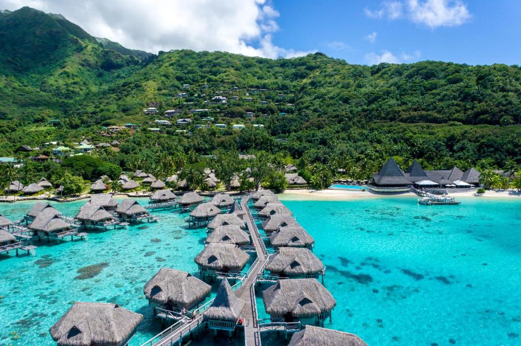 
a large body of water with boats in it at Sofitel Kia Ora Moorea Beach Resort in Maharepa
