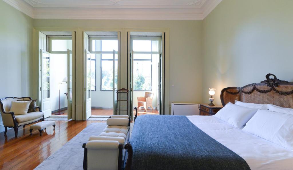 Postel nebo postele na pokoji v ubytování Maison des Amis Porto