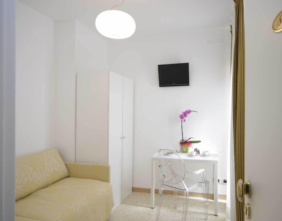 TV a/nebo společenská místnost v ubytování Hotel Adriatico